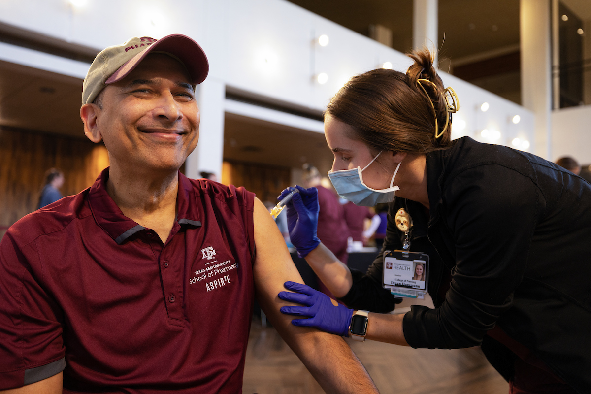 Public Health students learn about the importance of community health initiatives like the flu vaccine drive